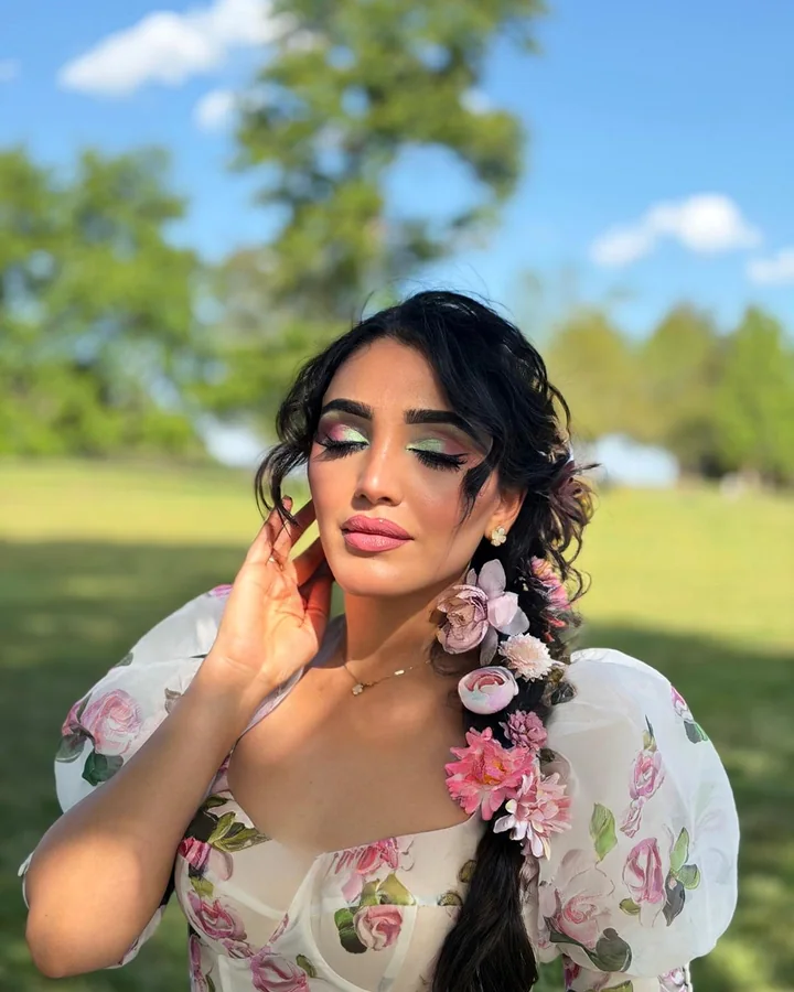 Outdoor floral makeup portrait by Hellah Sardar