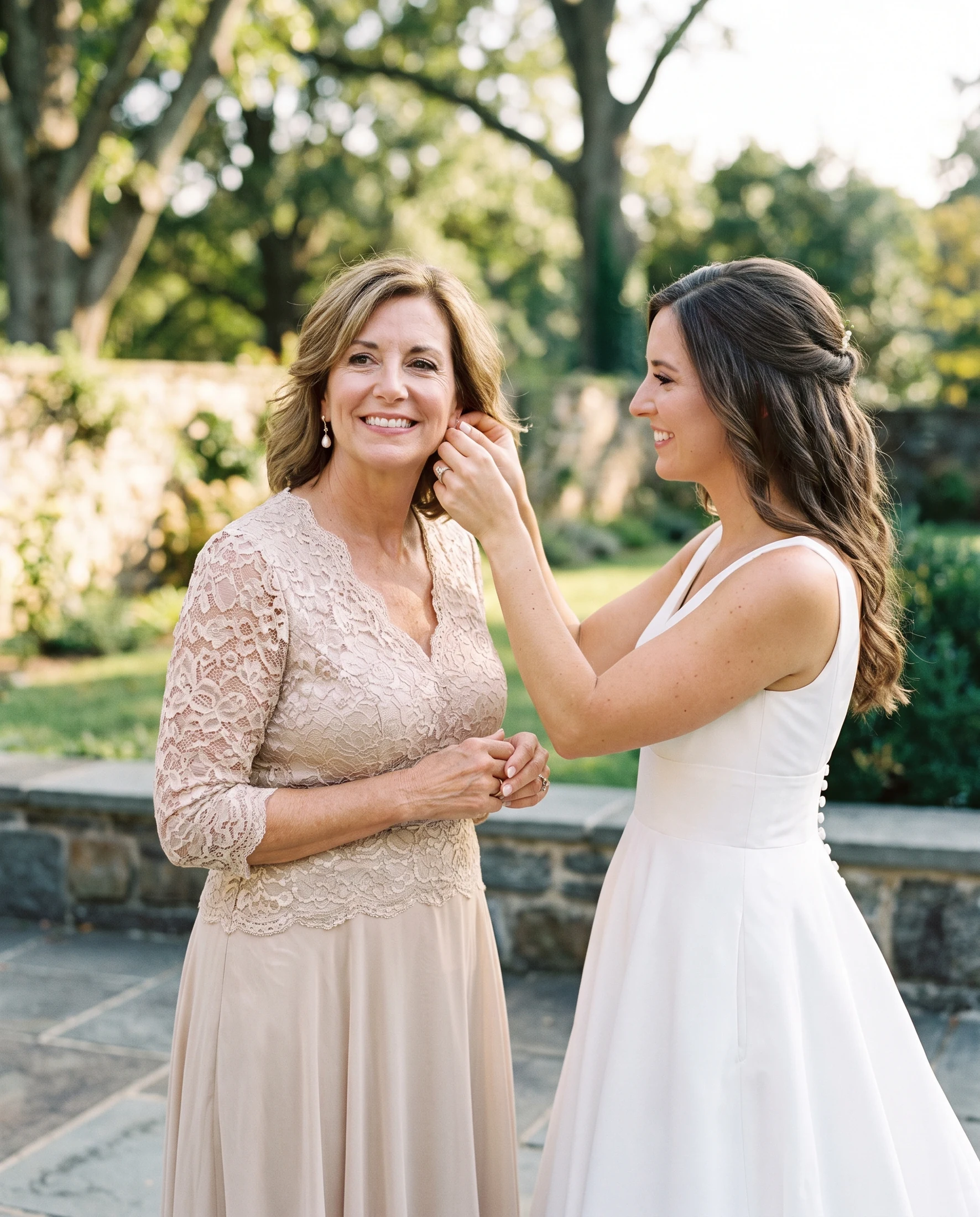 American mother of the bride preparing with her daughter